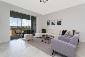Townhome, Multiple Beds, Pool Access (CHG104-9345-3) | Living area - Townhouse 3 BR, 2.5 BA Villa Sleeps 10! (Davenport)
