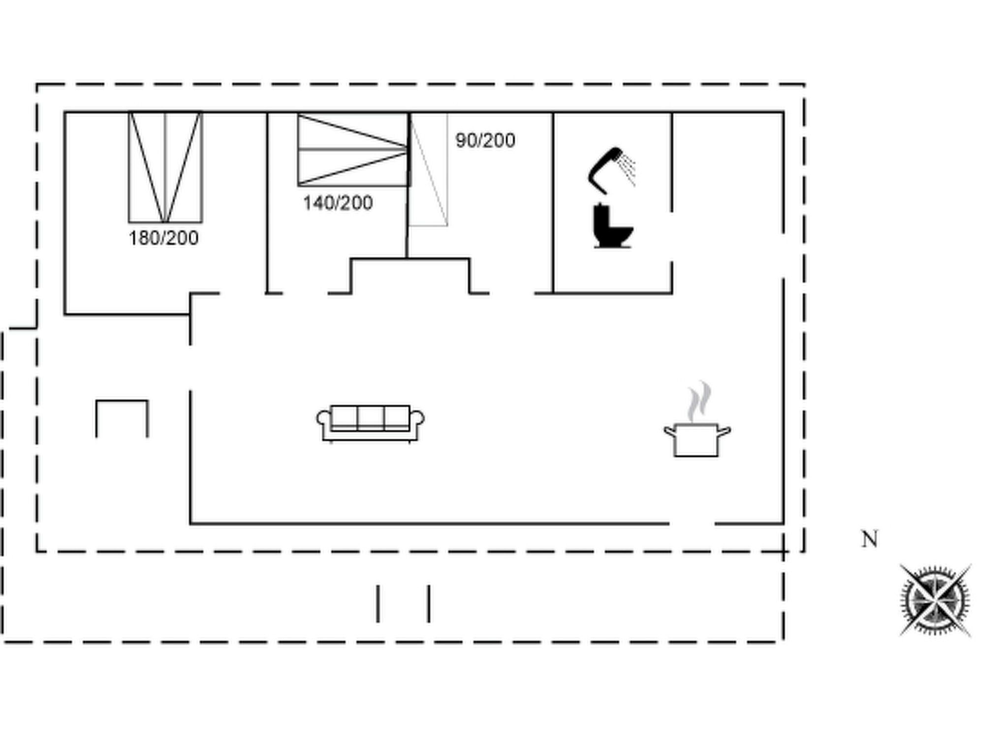 A floor plan with a kitchen, a dining area, a living room, and a bathroom.
