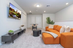 Townhome, Multiple Beds, Pool Access, Pool View (WI103-4178-5-GP) | Living area - Modern Vacation Home 5 BR, 4.5 BA Villa Sleeps 12! (Davenport)