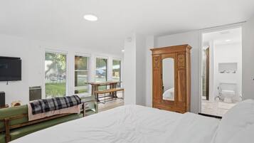 3 habitaciones, tabla de planchar con plancha y cuna de viaje