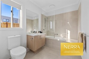 Bathroom - Modern 3-bedroom, 3-bathroom home with premium amenities throughout. (Officer)