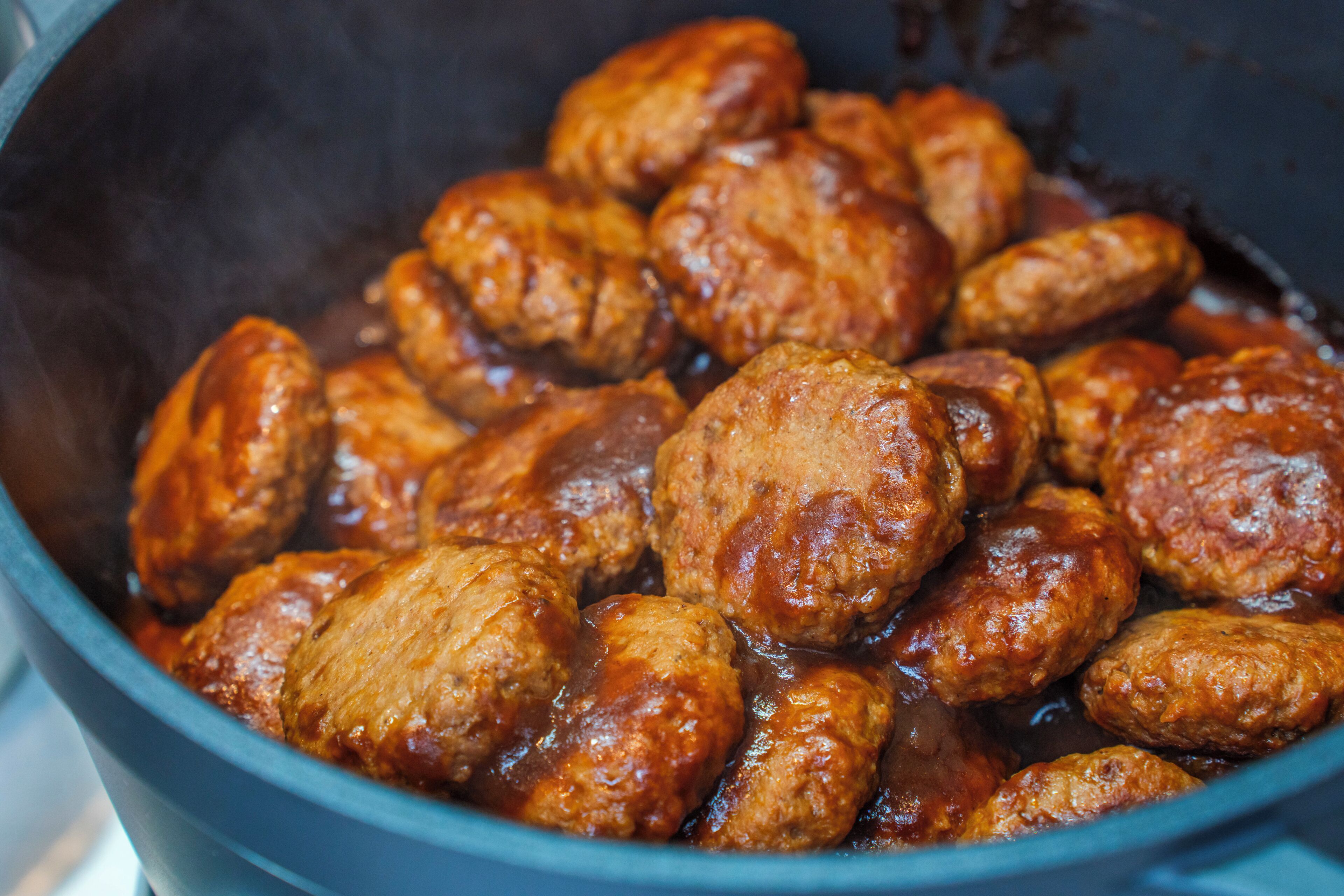 A close-up of a pot containing food items.