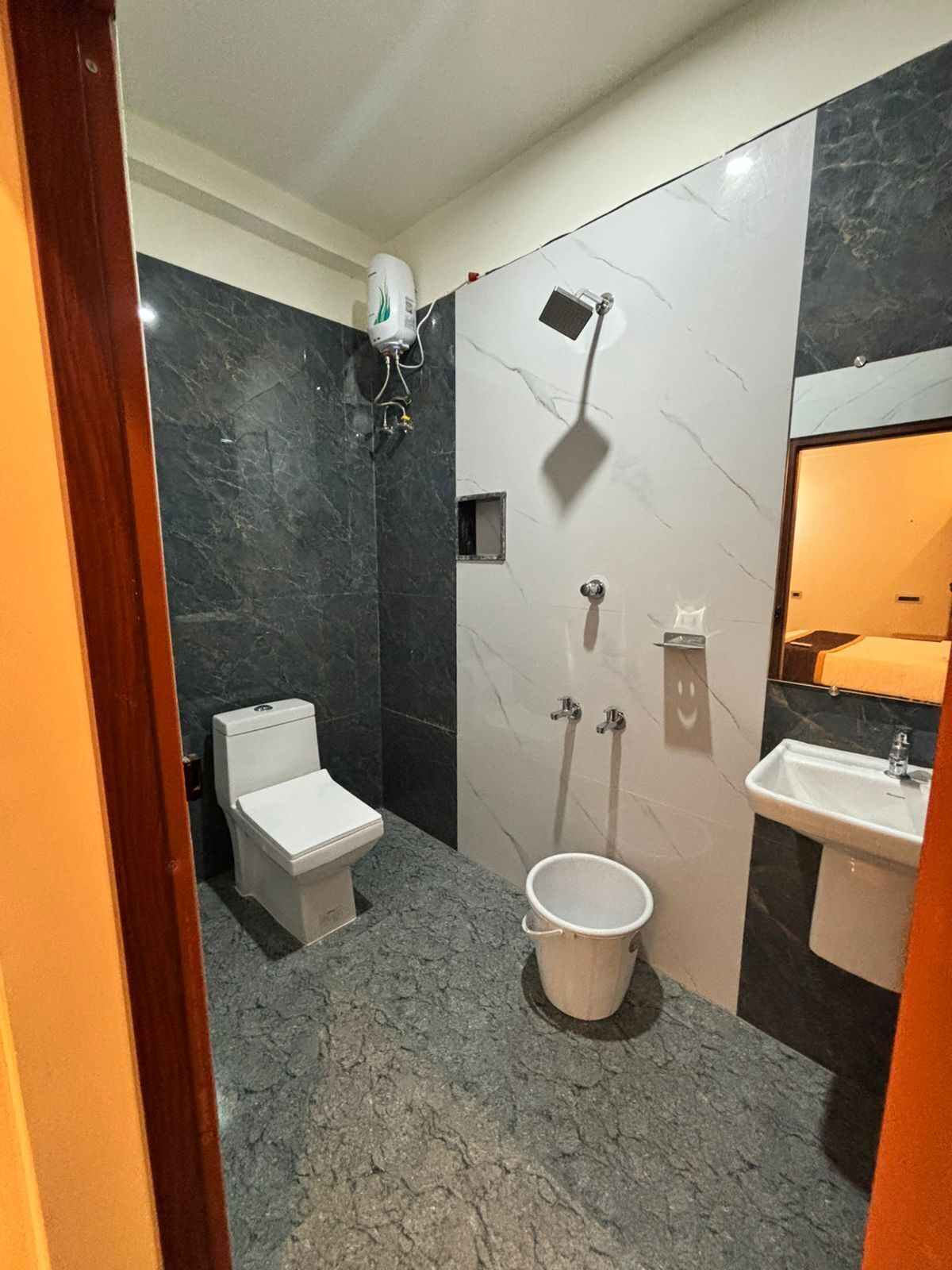 Separate tub and shower, towels, soap, shampoo