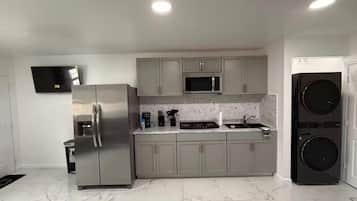 Coffee/tea maker, microwave, dishwasher, cookware/dishes/utensils