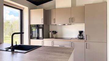 Fridge, stovetop, coffee/tea maker, cookware/dishes/utensils