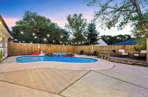 Outdoor pool, a heated pool - Cozy Meets Fun, Pool, Hot Tub, Instagrammable Spaces, & Close to IAH Airport (Spring)
