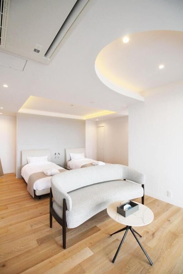 Chambre supérieure avec lits jumeaux, piscine privée, vue sur la mer | Intérieur