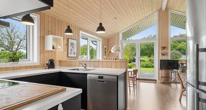 Modern holiday home near beach and nature Helnaes