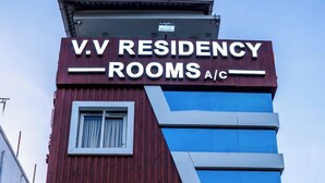 A building with a sign reading 'V.V RESIDENCY ROOMS A/C'. - V V Residency (Thanjavur)