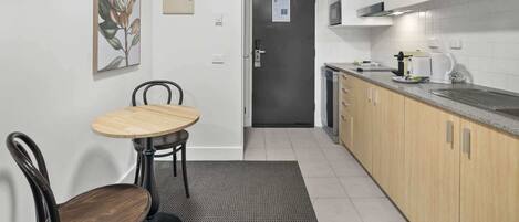 Coffee/tea maker, fridge, microwave, oven