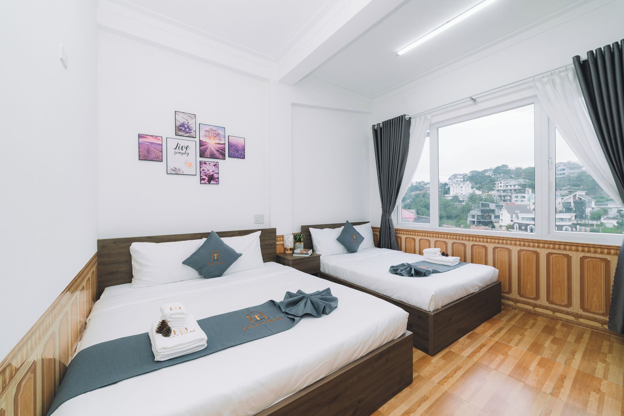 Deluxe Quadruple Room, City View | Iron/ironing board, free WiFi