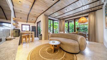 Luxury Villa, Pool View | Living area | 50-inch Smart TV with digital channels