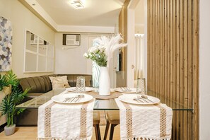 Dining - AR12 H&B Rentals 1Bedroom Unit w/ WiFi Netflix and Free Pool Access (Davao City)