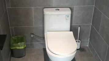 Comfort Room | Bathroom | Slippers, towels, soap, shampoo