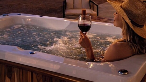 A hot tub with a sunset view, stone pillars, and string lights. - Baja Toscana Private Wine CountryRetreat (Valle de Guadalupe)