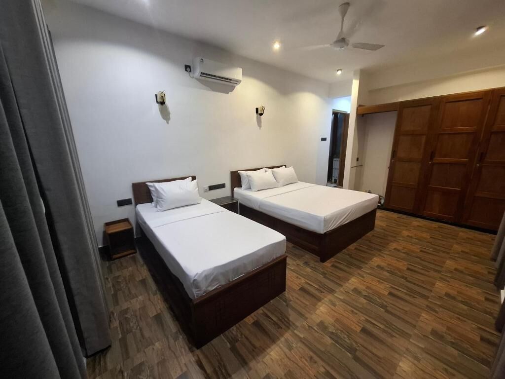 Standard Triple Room, Balcony, Mountain View | Desk, laptop workspace, blackout drapes, iron/ironing board