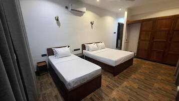 Standard Triple Room, Balcony, Mountain View | Desk, laptop workspace, blackout drapes, iron/ironing board