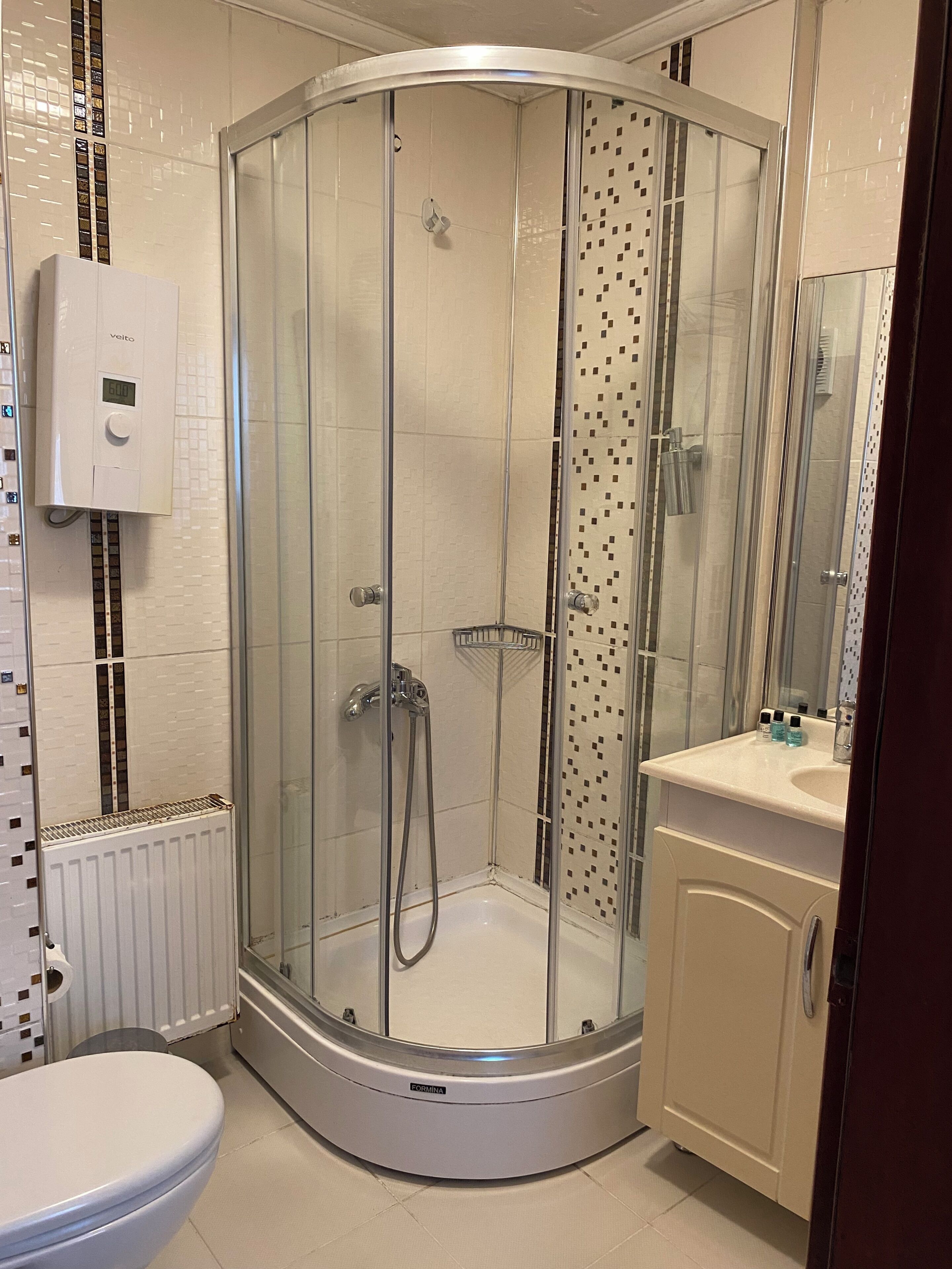 Standard Room, City View | Bathroom | Shower, hair dryer, towels, soap