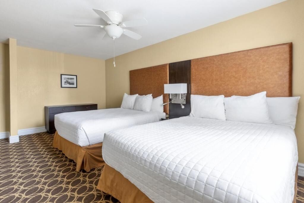 Relax in a bright, comfortable bedroom designed for deep sleep.