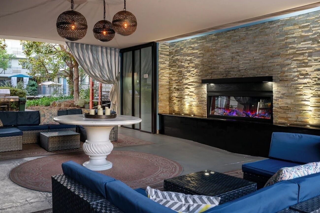 Gather with friends on plush seating beside the warm fire
