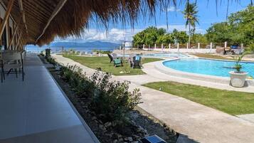 Outdoor pool, open 8:00 AM to 10:00 PM, pool umbrellas, sun loungers