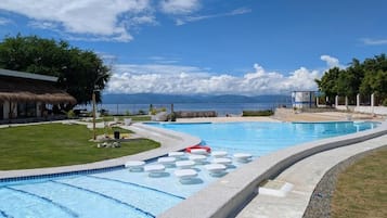 Outdoor pool, open 8:00 AM to 10:00 PM, pool umbrellas, sun loungers