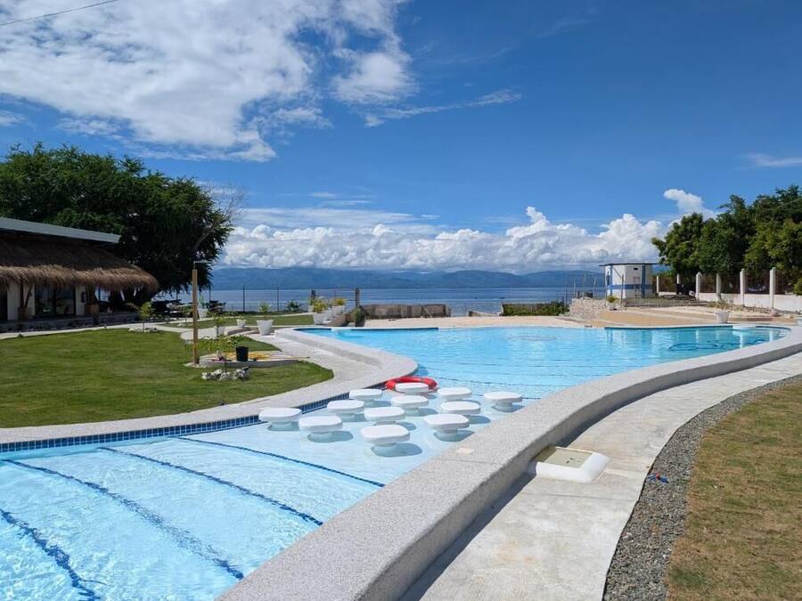 Outdoor pool, open 8:00 AM to 10:00 PM, pool umbrellas, pool loungers