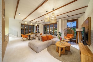 Luxury Villa, Pool View | Living area | 50-inch Smart TV with digital channels - Tropical Tribe - Peaceful Oasis  (Ubud)