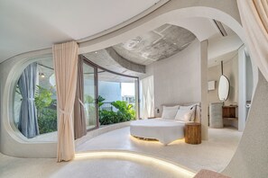 A modern bedroom with a curved ceiling, a large window, and a bed with a wooden side table. - Draco Residence Da Nang (Da Nang)
