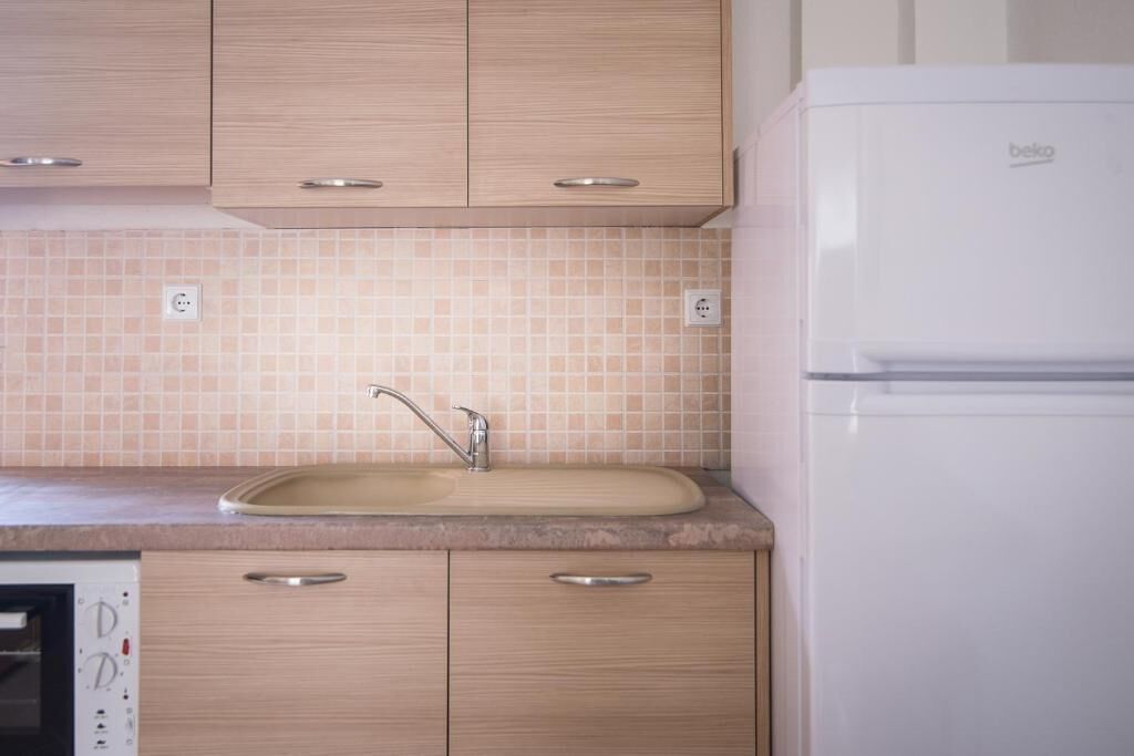 Departamento, balcón, vista a la ciudad | Cocina privada