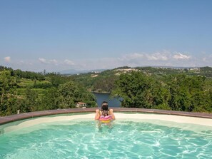 15 outdoor pools, pool umbrellas, pool loungers