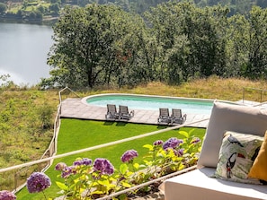 15 outdoor pools, pool umbrellas, pool loungers