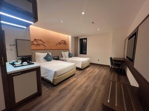 Chambre Deluxe Double ou avec lits jumeaux | Bureau, rideaux occultants, Wi-Fi gratuit