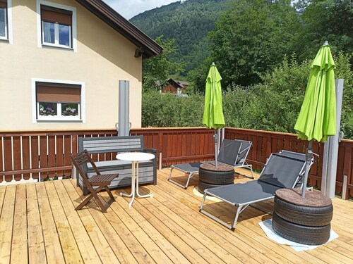 Appartement Ri-Wo avec terrasse commune, jardin et Wi-Fi