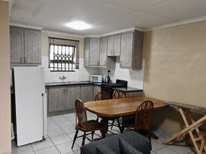 Chambre Quadruple | Cuisine privée
