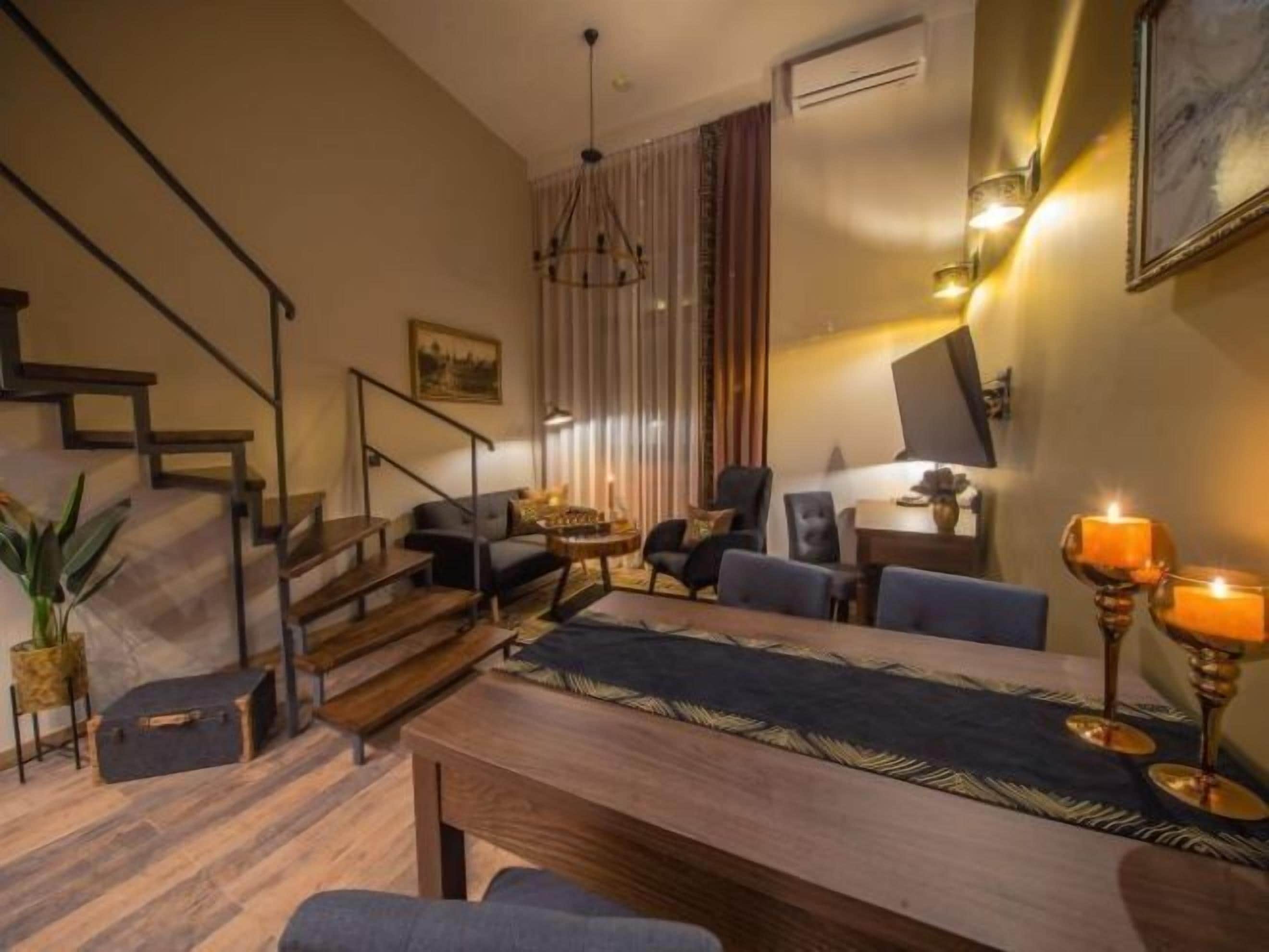 Family Apartment, City View | Individually furnished, iron/ironing board, bed sheets
