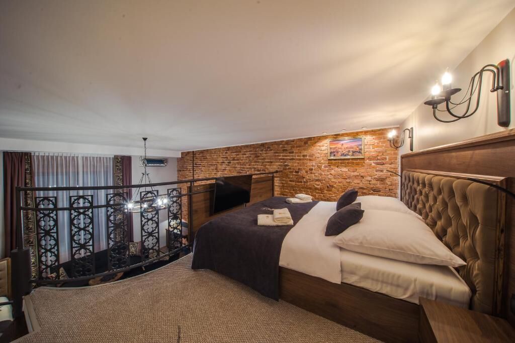 Comfort Apartment, Courtyard View | Individually furnished, iron/ironing board, bed sheets