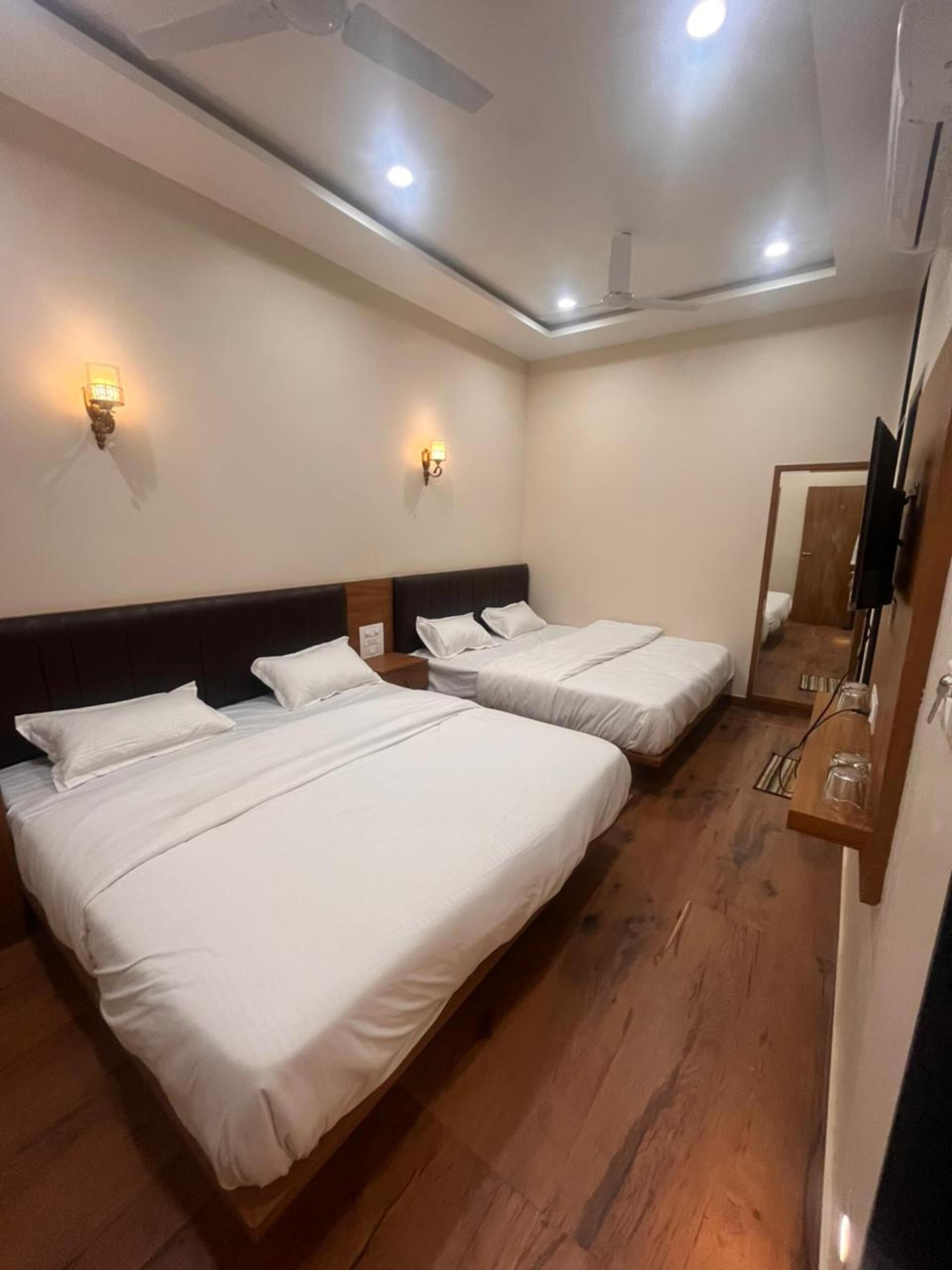 Quarto família | Camas extras/dobráveis (sobretaxa), Wi-Fi de cortesia, roupa de cama
