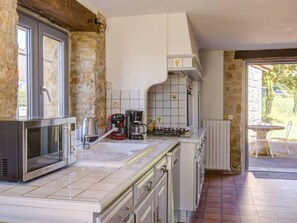 Coffee/tea maker, fridge, microwave, oven