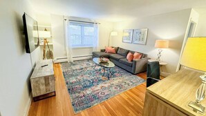 Living area - Sunlit 2BR with In-Unit Laundry (Brookline)
