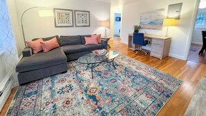 Living area - Sunlit 2BR with In-Unit Laundry (Brookline)
