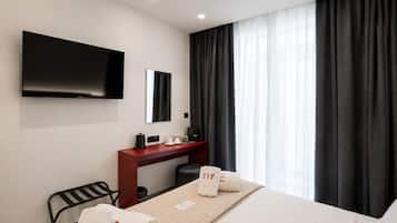 Deluxe Double or Twin Room, Balcony | In-room safe, desk, laptop workspace, soundproofing