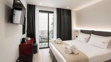 Deluxe Double or Twin Room, Balcony, City View | In-room safe, desk, laptop workspace, soundproofing