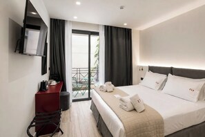 Deluxe Double or Twin Room, Balcony, City View | In-room safe, desk, laptop workspace, soundproofing