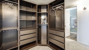 A walk-in closet with open shelves, a mirror, and a hanging rack. - Wfh-friendly Retreat w/ Office Near Silicon Valley (Hayward)