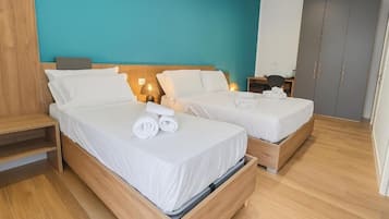 Luxury Triple Room, Balcony | In-room safe, laptop workspace, free WiFi