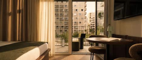 Premium Studio, Balcony | Minibar, in-room safe, desk, laptop workspace