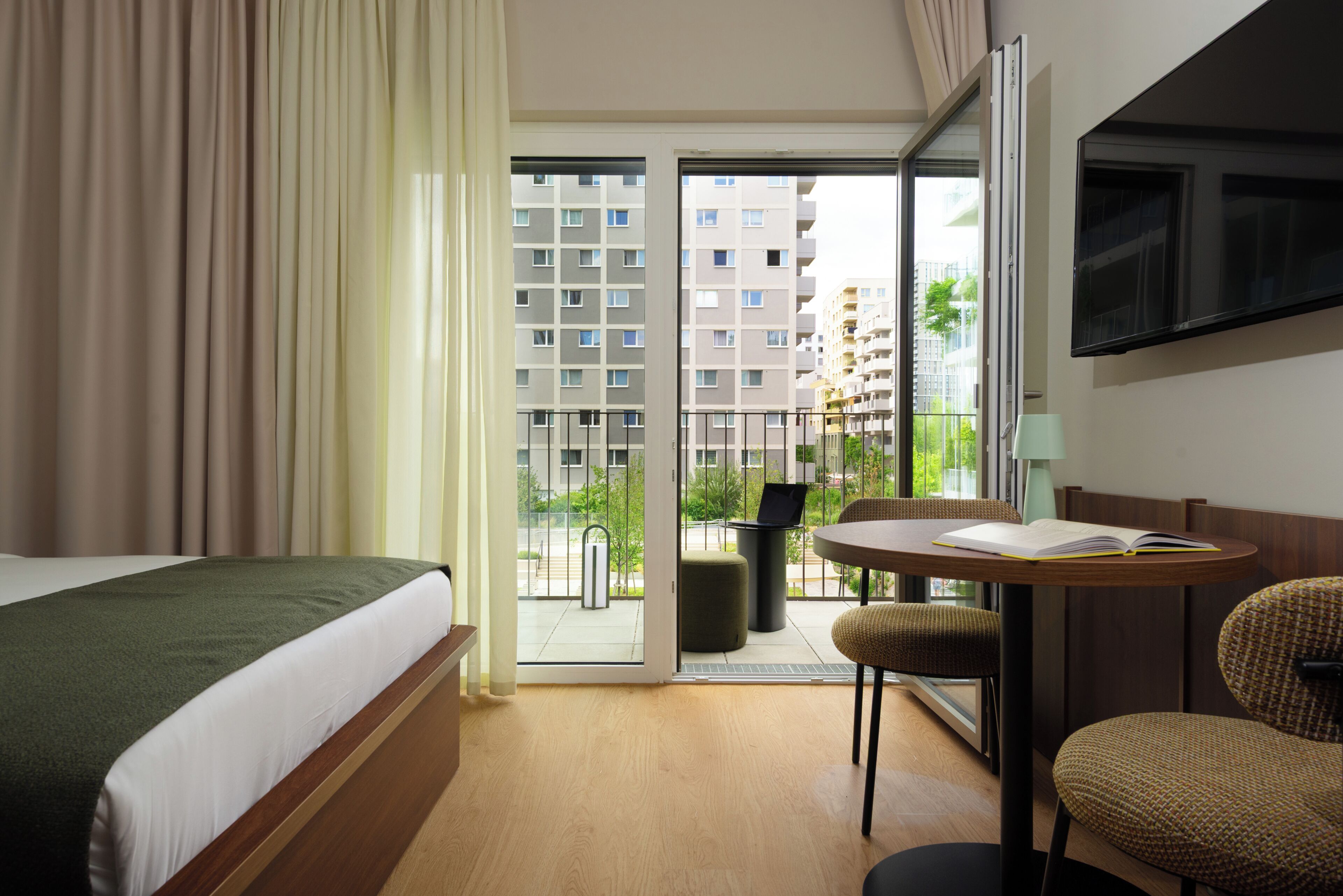 Premium Studio, Balcony | Minibar, in-room safe, desk, laptop workspace