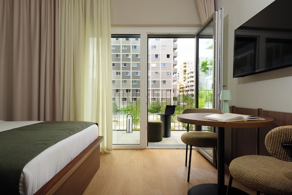 Premium Studio, Balcony | Minibar, in-room safe, desk, laptop workspace