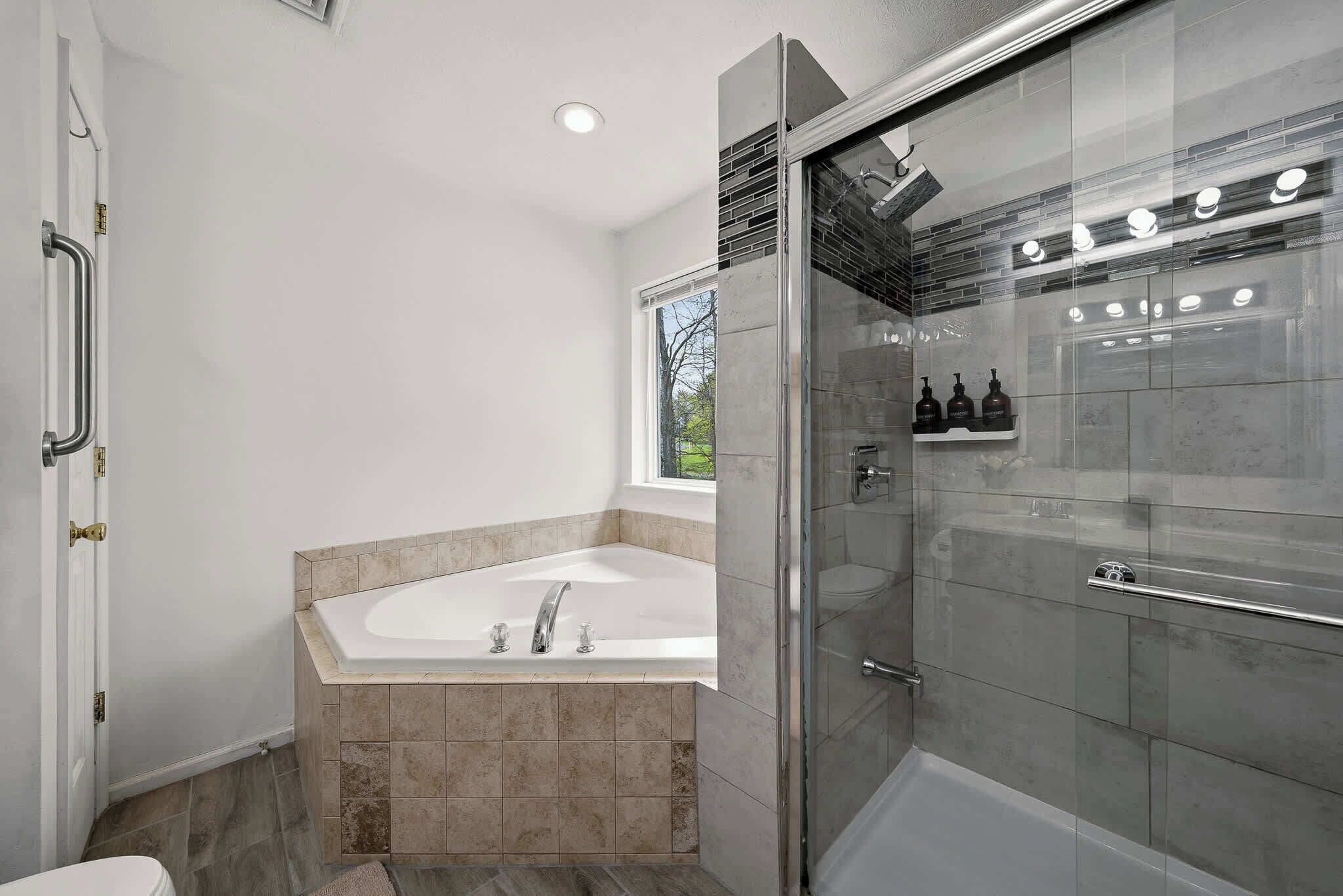 Shower, hair dryer, towels, shampoo